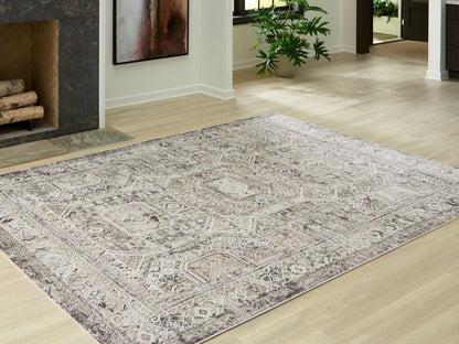 Junley rug from Unique Piece Furniture with beige-gray distressed oriental pattern on Tampa Home & Garden Store