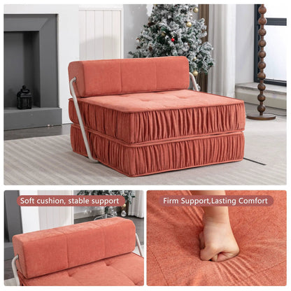 Folding futon chair in coral fabric with removable back cushion and metal frame in living room on Tampa Home & Garden Store