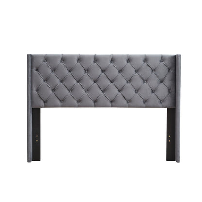 Velvet button-tufted gray queen platform bed with winged headboard and dark wood legs on Tampa Home & Garden Store