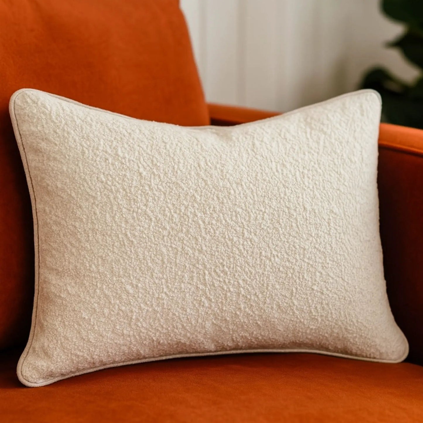 Homey Cozy ivory textured throw pillow by Unique Piece Furniture on orange sofa on Tampa Home & Garden Store