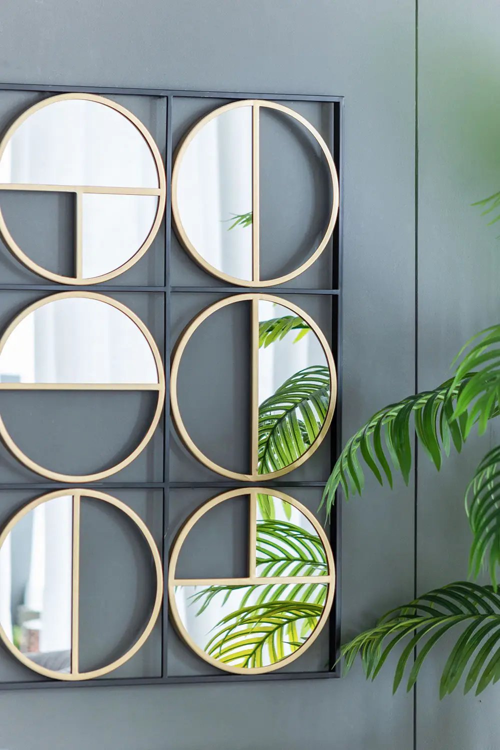 Accent mirrors: eclectic metal beaded gold-framed set, six round frames in a grid on Tampa Home & Garden Store