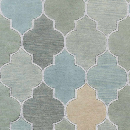 Eads Area Rug by Boutique Rugs in a pastel trellis pattern of blues greens and beige on Tampa Home & Garden Store