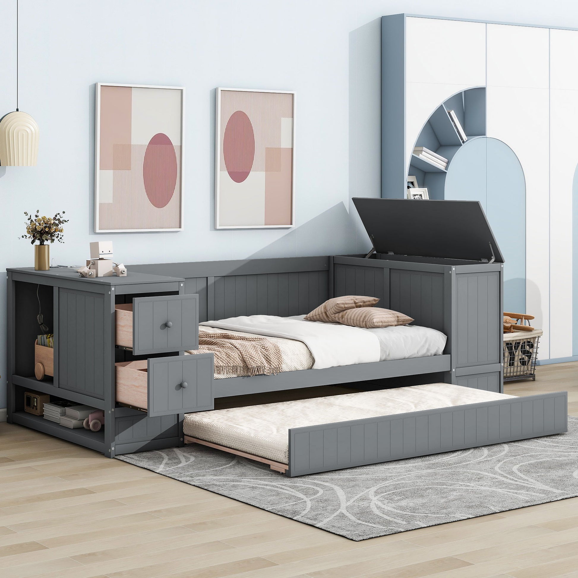 Daybed with storage arms, trundle and charging station in charcoal gray on Tampa Home & Garden Store