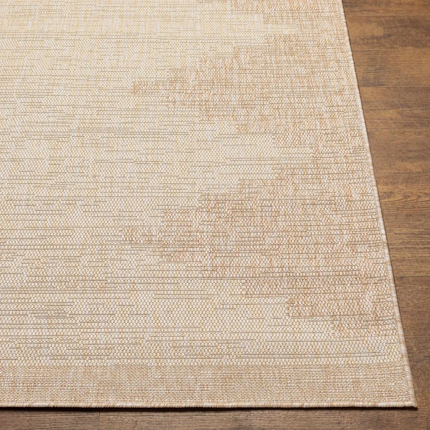 Djugun Beige Indoor & Outdoor Rug by Boutique Rugs with a neutral woven texture on wood floor on Tampa Home & Garden Store