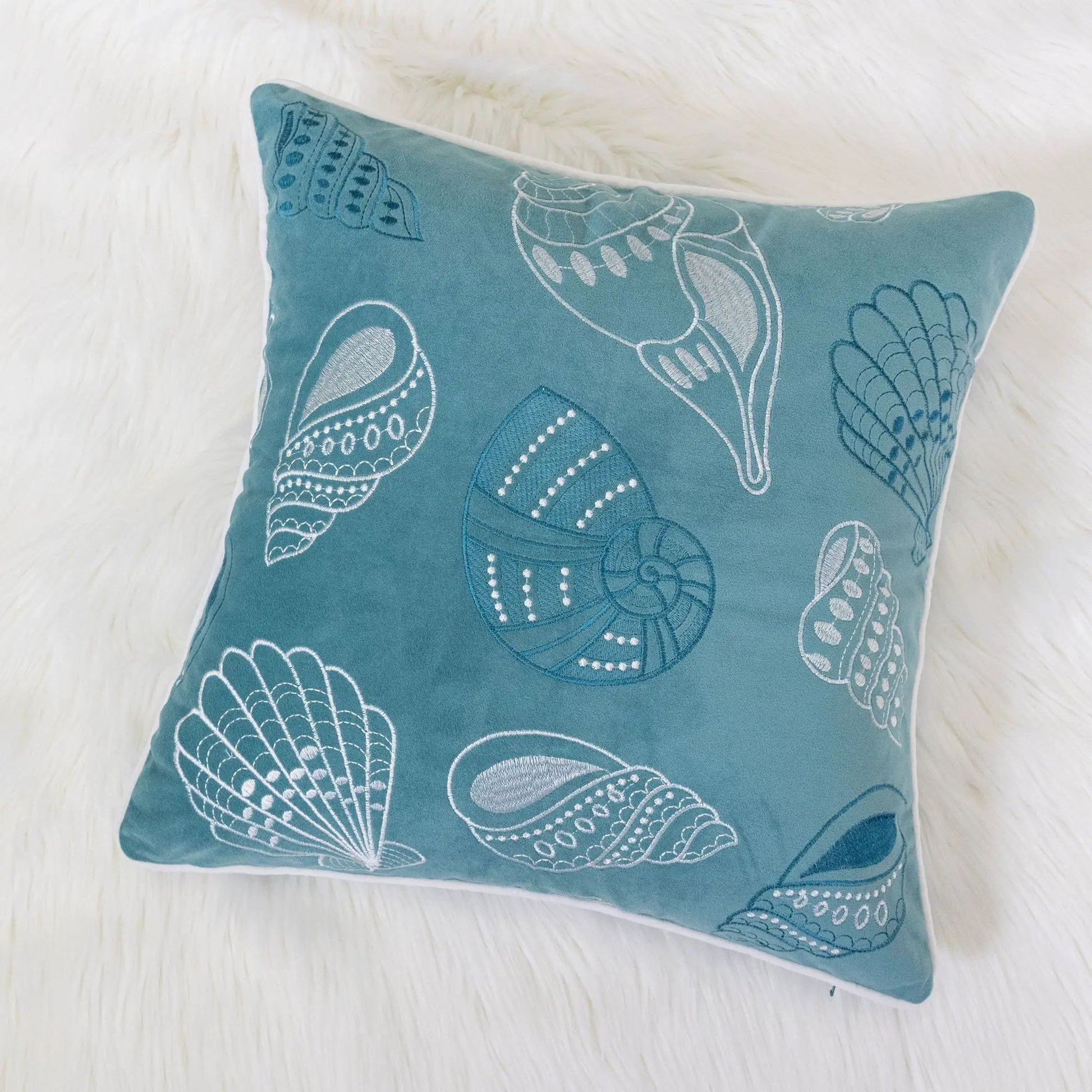 Seashells Pillow Cover teal blue with white embroidered seashells accent pillow on Tampa Home & Garden Store