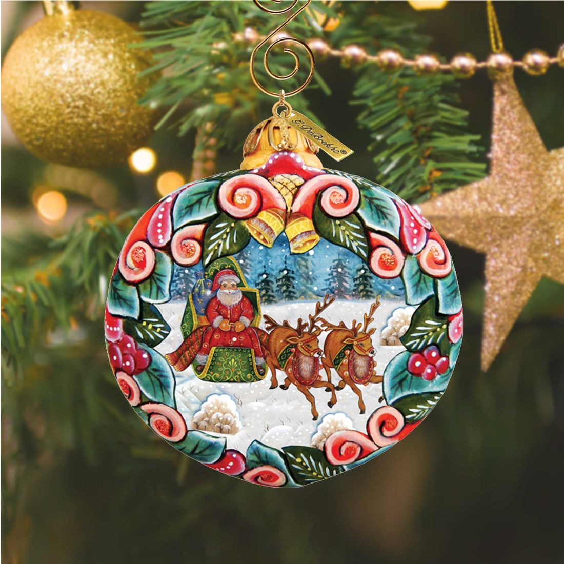 Sleigh Ride Sculpted Ornament by G. DeBrekht with Santa and reindeer in a border on Tampa Home & Garden Store