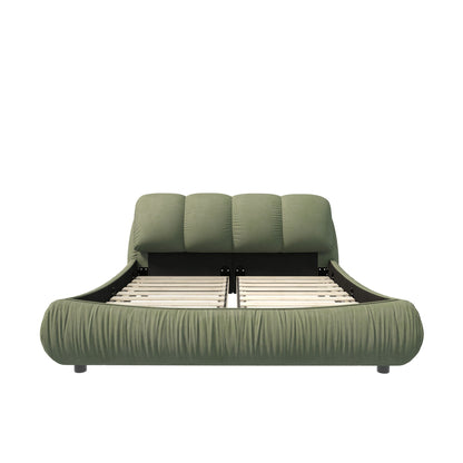 Green upholstered platform bed with oversized padded backrest and solid wood frame on Tampa Home & Garden Store