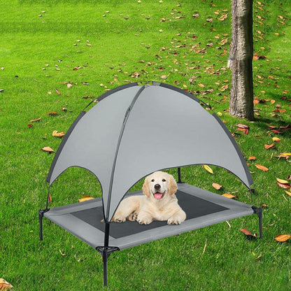 Pet loft bed tent with gray sunshade canopy, dog relaxing on platform bed in green yard on Tampa Home & Garden Store