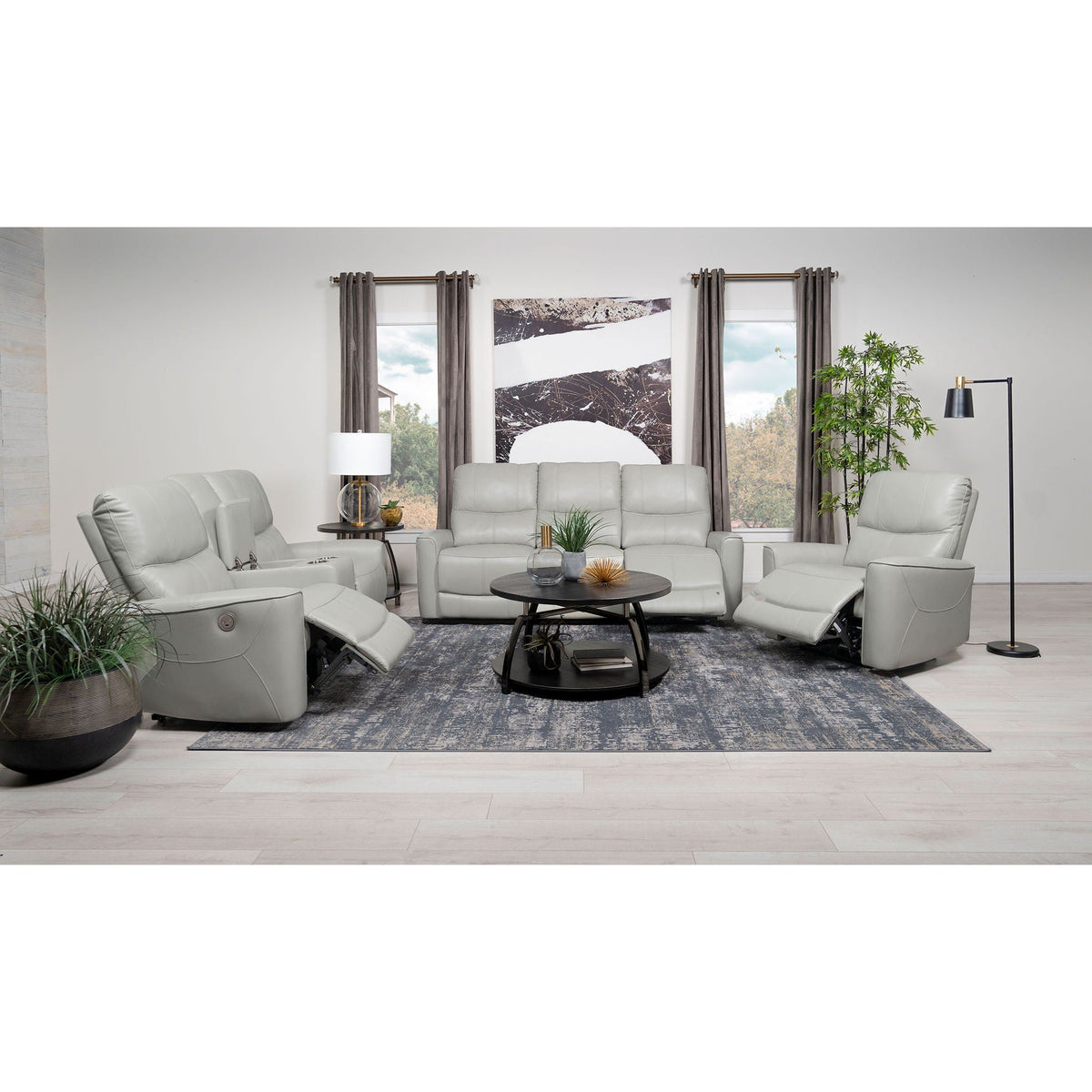 Dove upholstered power recliner chair with USB charging in gray in a living room setup on Tampa Home & Garden Store