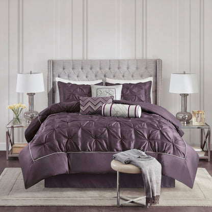 7 Piece Tufted Comforter Set on a King Bed