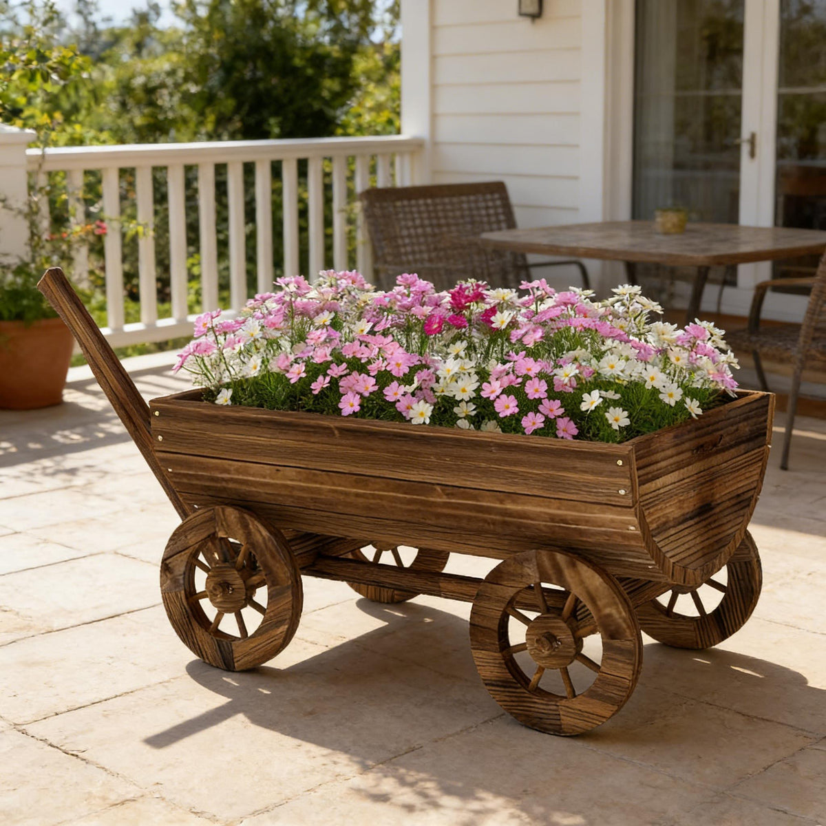 Small wooden wheelbarrow planter with drainage, rustic garden cart with pink flowers on Tampa Home & Garden Store