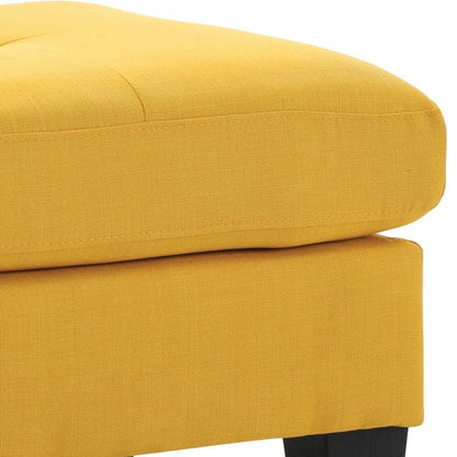 Upholstered ottoman in yellow fabric by HouseOfZazla with dark legs on Tampa Home & Garden Store