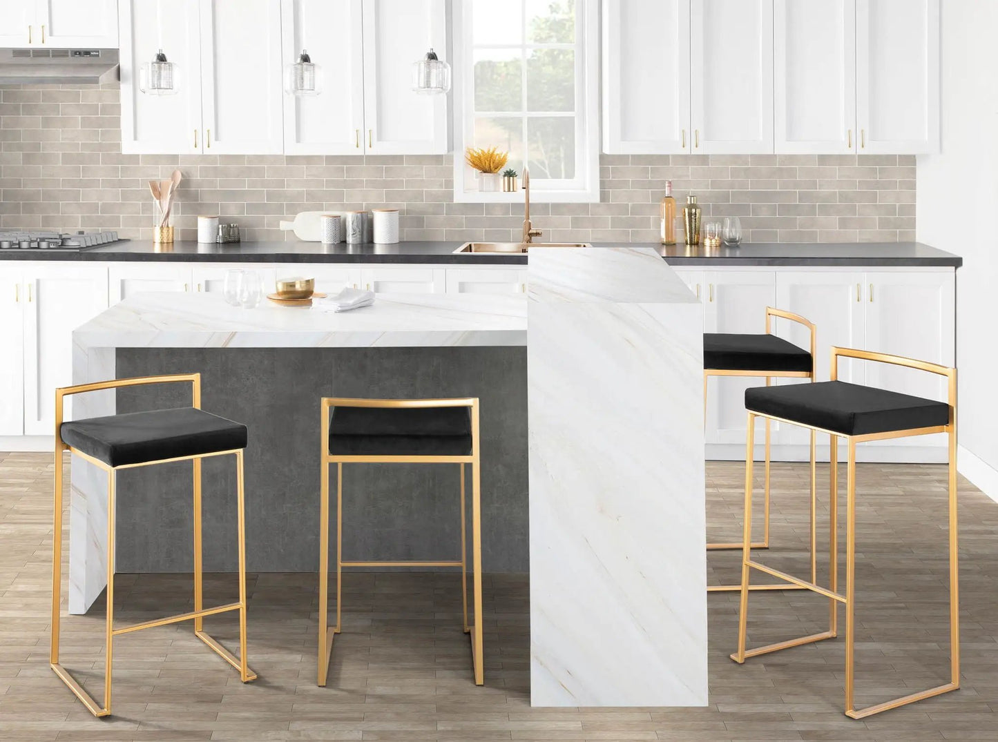 Fuji barstool set with gold frames and black cushions, four stools around a marble island on Tampa Home & Garden Store