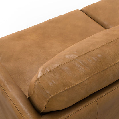 Livingston upholstered sofa close-up in tan leather with visible topstitching on Tampa Home & Garden Store