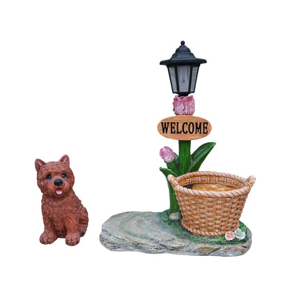 Sitting Puppy Solar Planter by HouseOfZazla, black lantern atop pink stems, wicker basket on Tampa Home & Garden Store