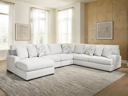 Misty-Lakes Sectional in light gray fabric, L-shaped with plush cushions in a bright living room on Tampa Home & Garden Store