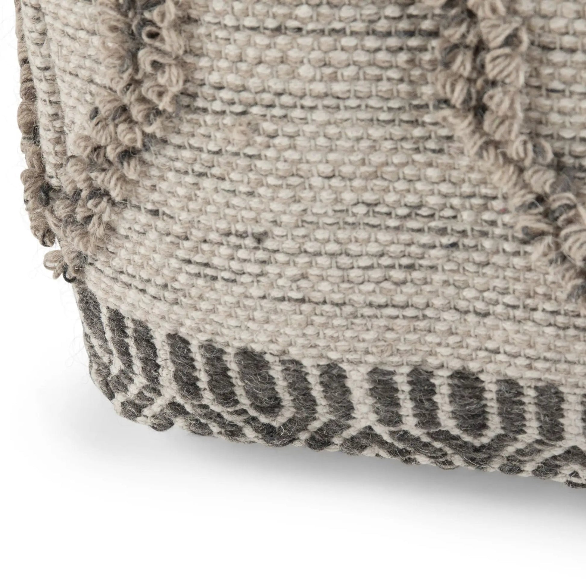 Sweeney Upholstered Square Pouf beige woven boucle fabric close-up with fringe trim on Tampa Home & Garden Store