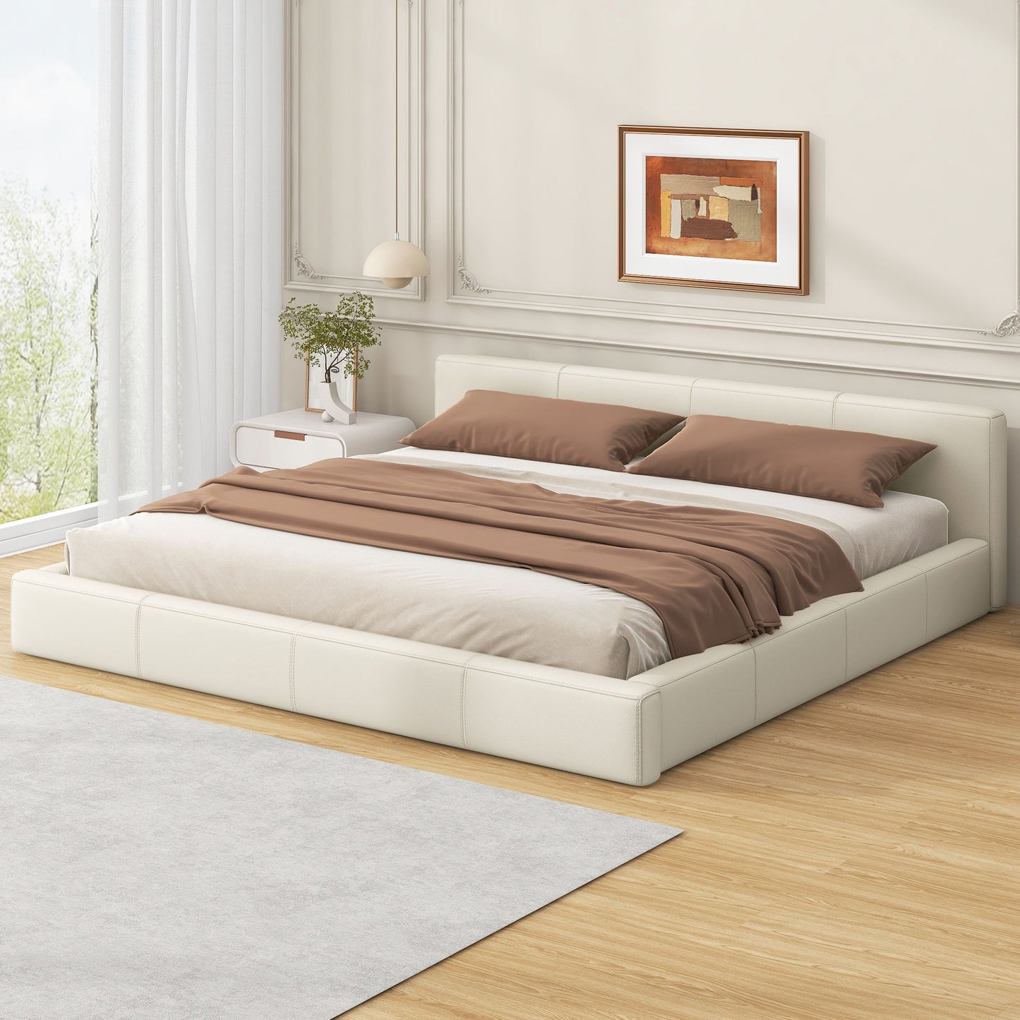 Stylish upholstered bed with birch wood frame in cream upholstery and brown bedding on Tampa Home & Garden Store