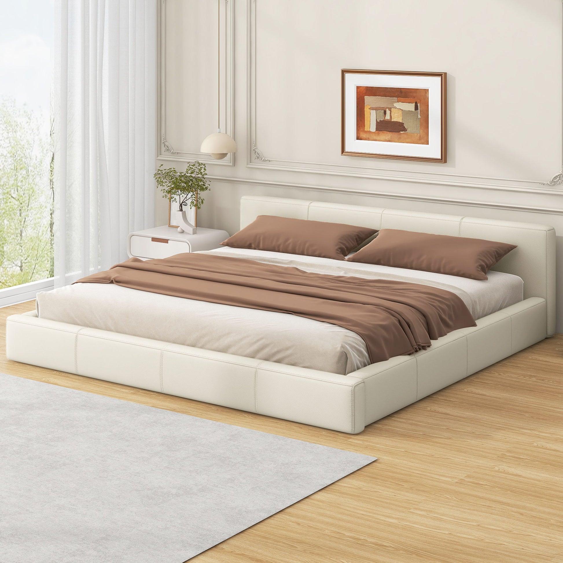 Stylish upholstered bed with birch wood frame in cream upholstery and brown bedding on Tampa Home & Garden Store