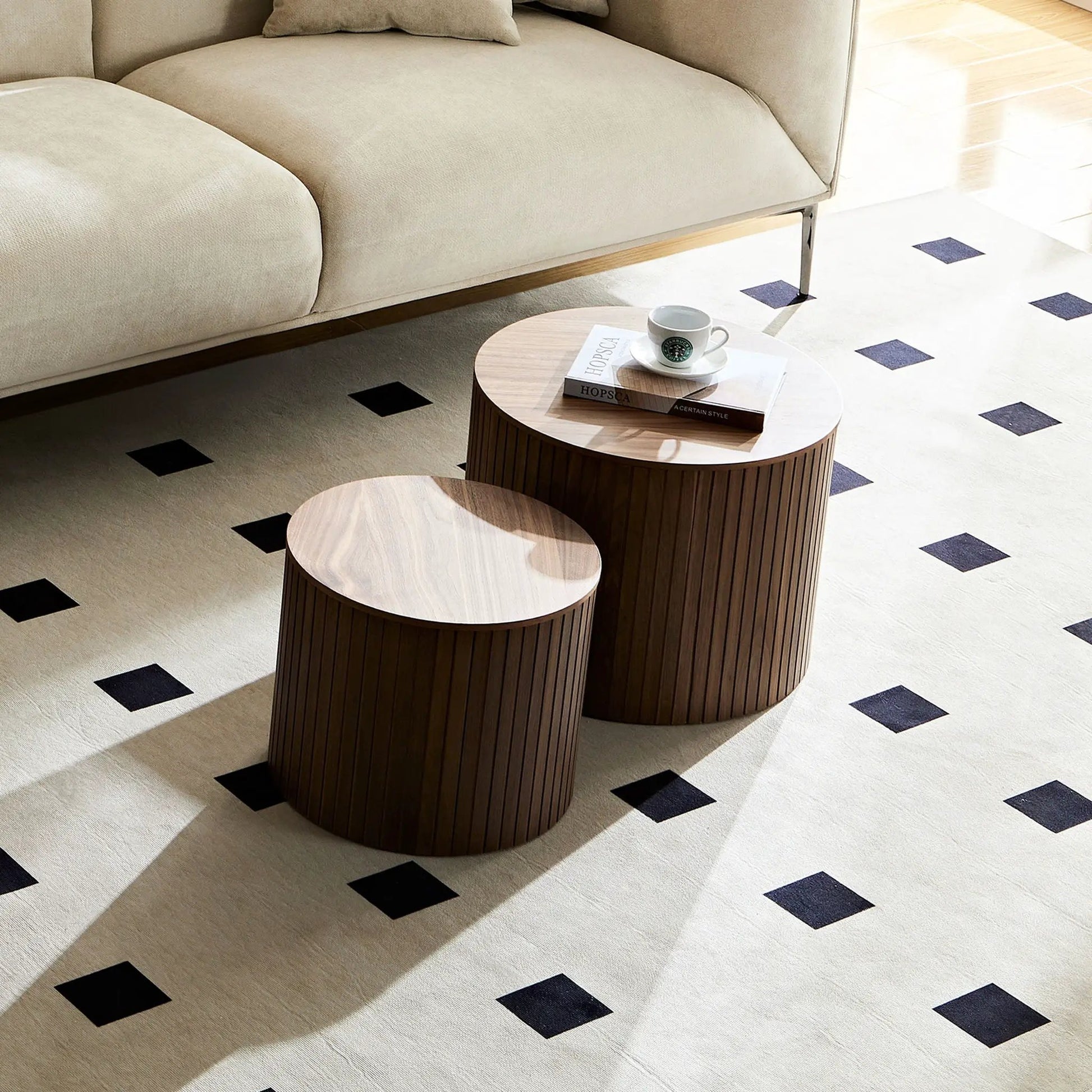 Handcrafted three nesting tables in natural wood with grooved sides on light rug on Tampa Home & Garden Store