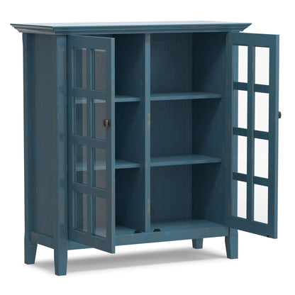 Acadian medium storage cabinet handcrafted in blue distressed finish with glass-pane door on Tampa Home & Garden Store