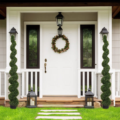 Artificial UV resistant green boxwood topiary spiral tree pair in pots flanking a front door on Tampa Home & Garden Store