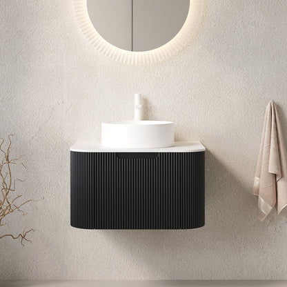 24in bathroom vanity with white vessel sink on a ribbed black cabinet and round backlit mirror on Tampa Home & Garden Store