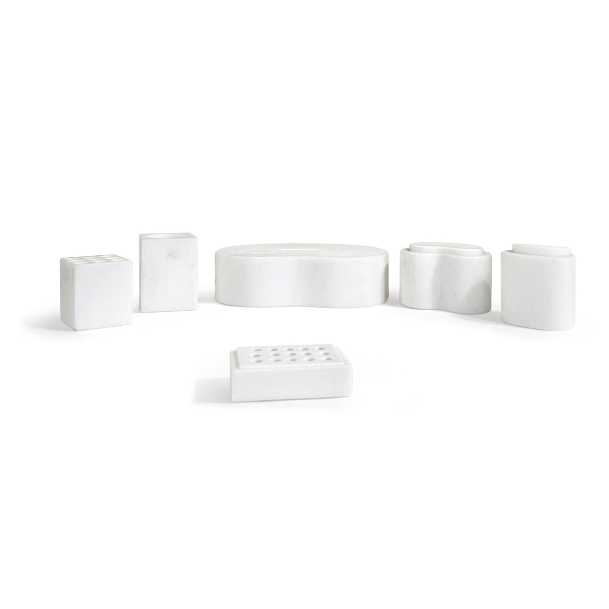 White marble bathroom organizers set with rectangular blocks, circular tray, and dish on Tampa Home & Garden Store