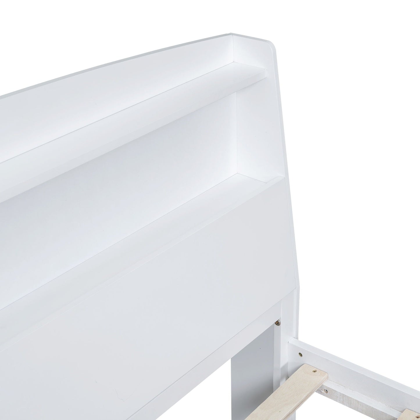 White platform bed frame close-up with exposed trundle rail on Tampa Home & Garden Store