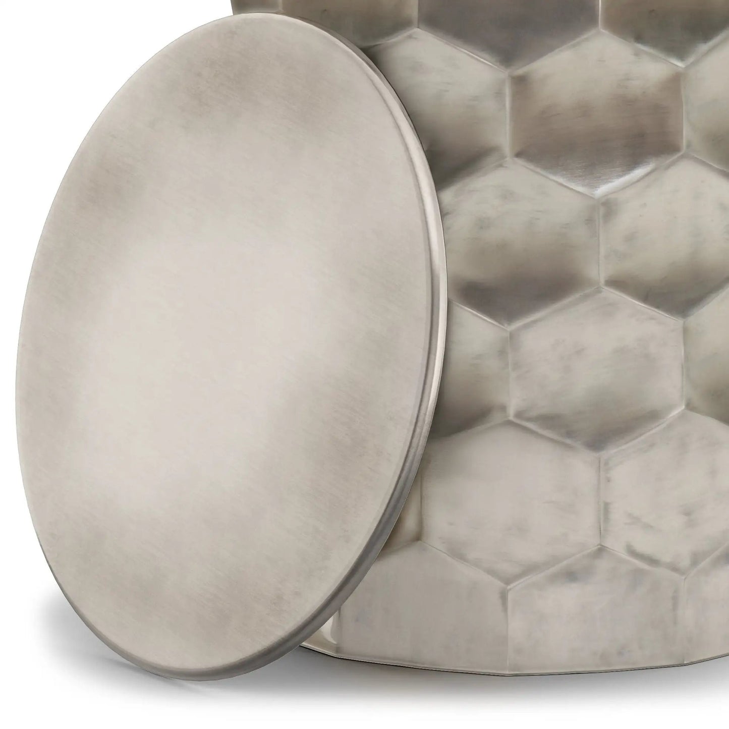 Whitney Metal Storage Table; circular brushed steel top beside quilted metal backdrop on Tampa Home & Garden Store