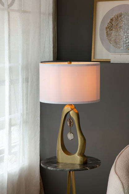 Geode-Inspired Gold Aluminum Table Lamp with pink shade and sculptural base on Tampa Home & Garden Store