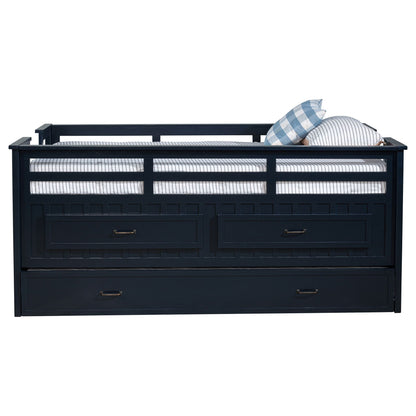 Starboard captain's bed with trundle in dark navy finish and striped bedding on Tampa Home & Garden Store