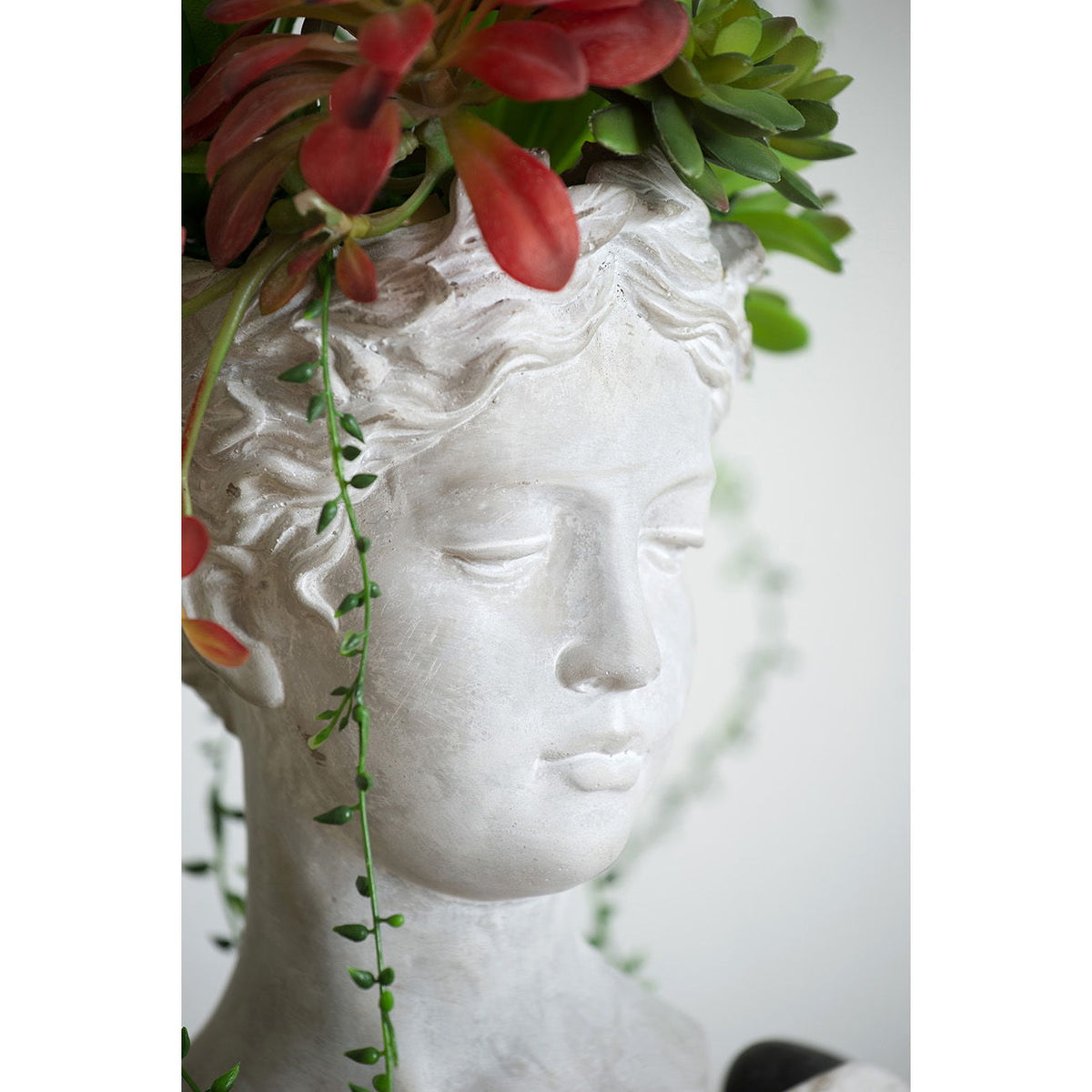 Planter Greek style cement head planter in gray with green trailing vines and red foliage HouseOfZazla on Tampa Home & Garden Store