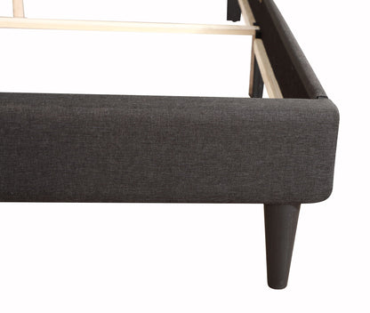 Upholstered bench with dark textured fabric, tapered wooden leg and light wood frame on Tampa Home & Garden Store