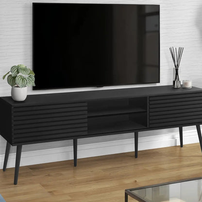 Black TV stand with slatted doors and open shelf in a contemporary living room on Tampa Home & Garden Store