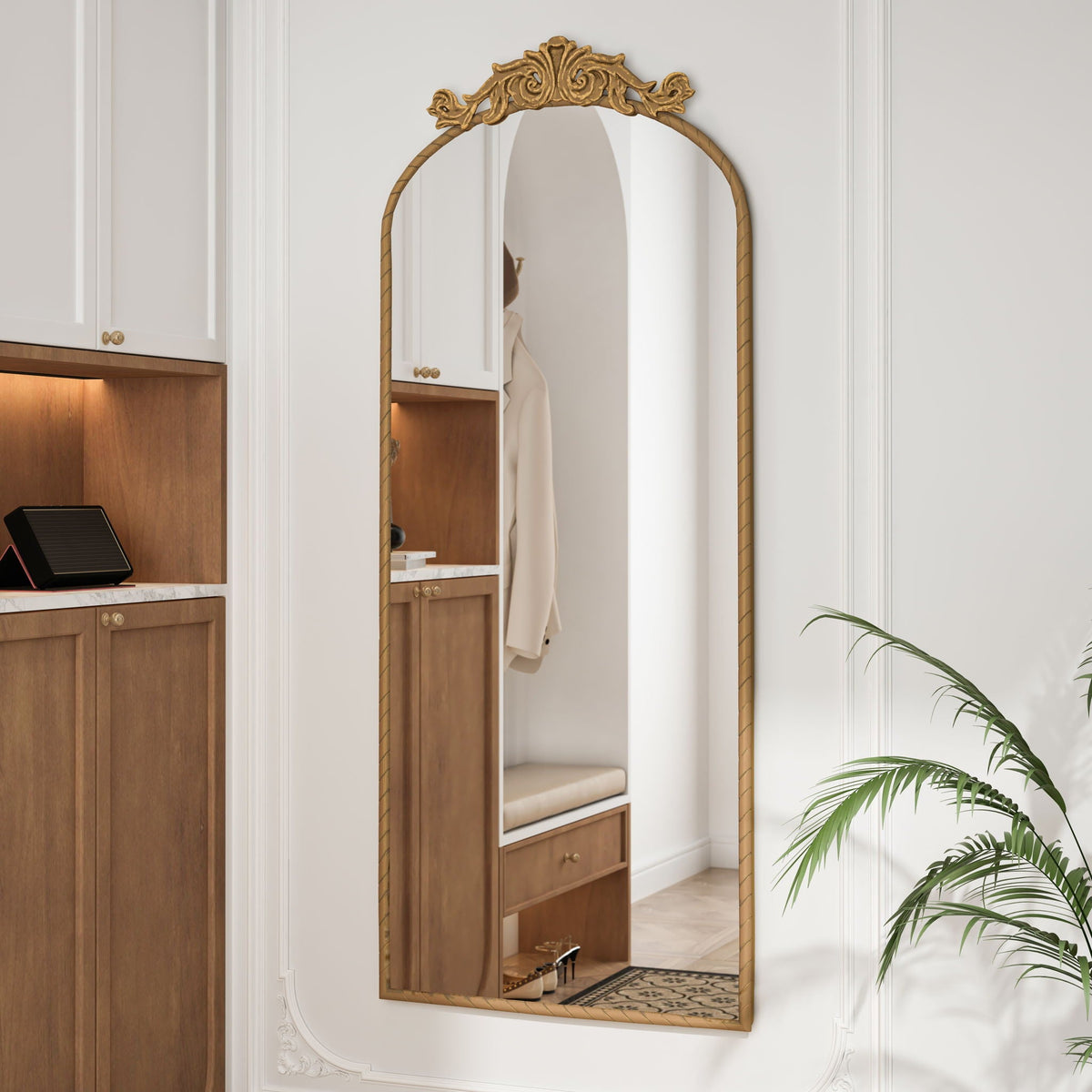 Vintage arched full-body mirror with carved bronze applique on Tampa Home & Garden Store