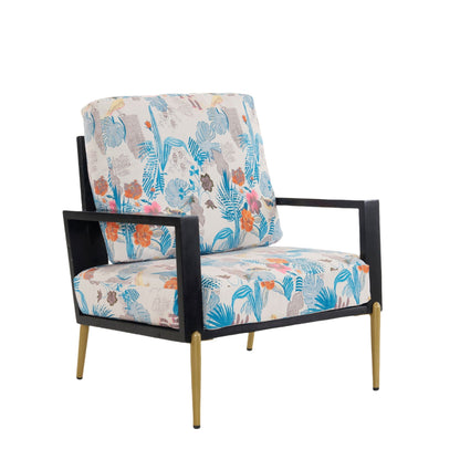 Modern armchair with black wood frame and gold legs, tropical floral upholstery on Tampa Home & Garden Store