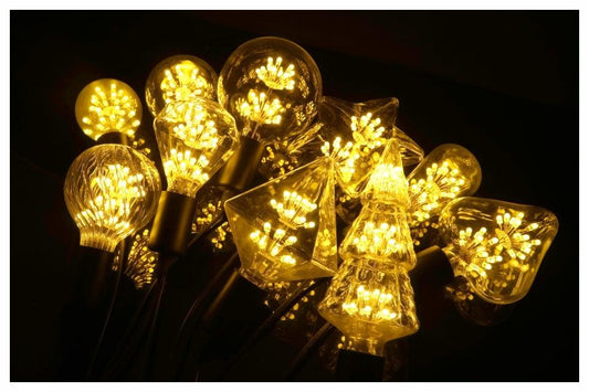 Stevvex ST50DE3821SIQ Edison-style LED vintage bulbs set with warm glow, stained-glass shapes on Tampa Home & Garden Store