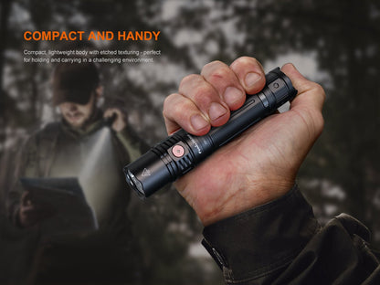 Fenix PD36R V2 compact tactical flashlight black with copper accent button, 1700 lumens on Tampa Home & Garden Store
