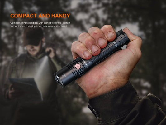 Fenix PD36R V2 compact tactical flashlight black with copper accent button, 1700 lumens on Tampa Home & Garden Store