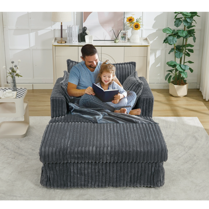 Oversized Corduroy Chaise Lounge with Ottoman in Dark Gray with two people reading on Tampa Home & Garden Store