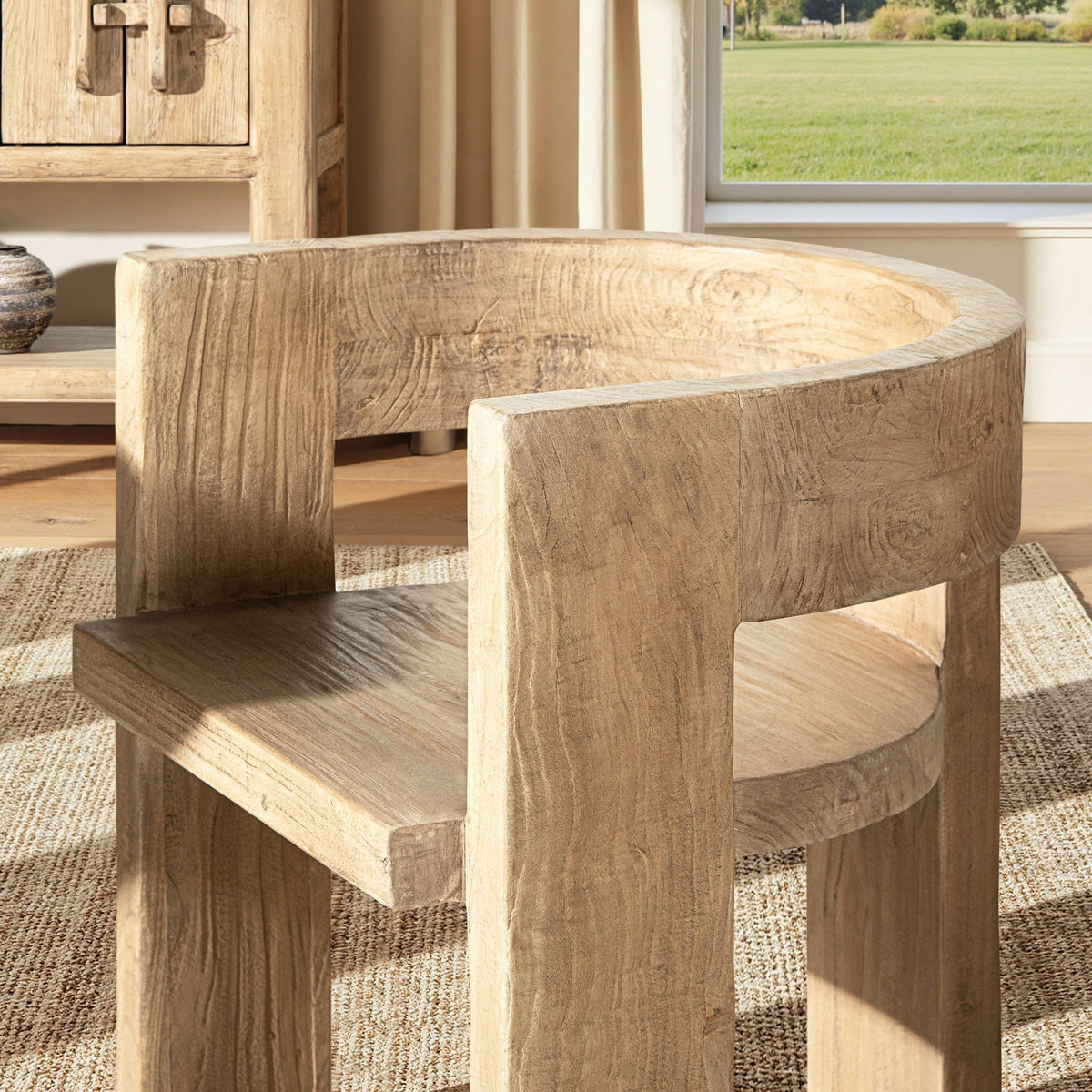 Accent curved dining chair with sculptural wood frame in brown finish on Tampa Home & Garden Store