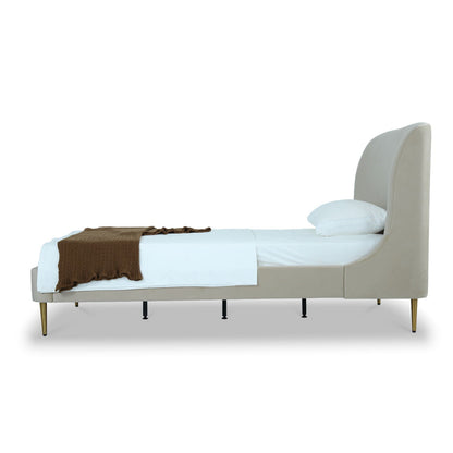 Mid-Century Modern upholstered bed with curved beige headboard and gold legs on Tampa Home & Garden Store