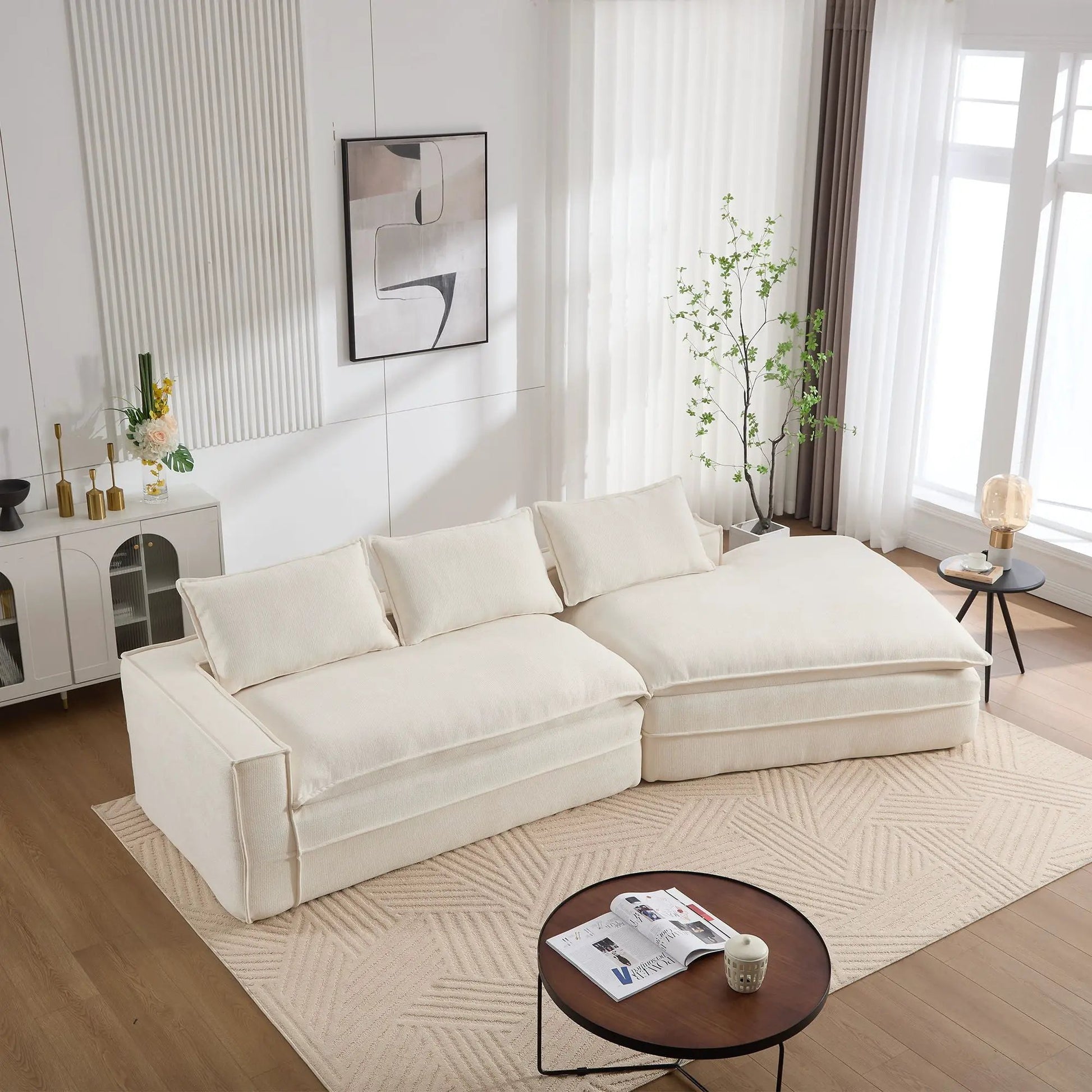 Modern minimalist modular sectional sofa with deep seats and right facing chaise in cream fabric on Tampa Home & Garden Store