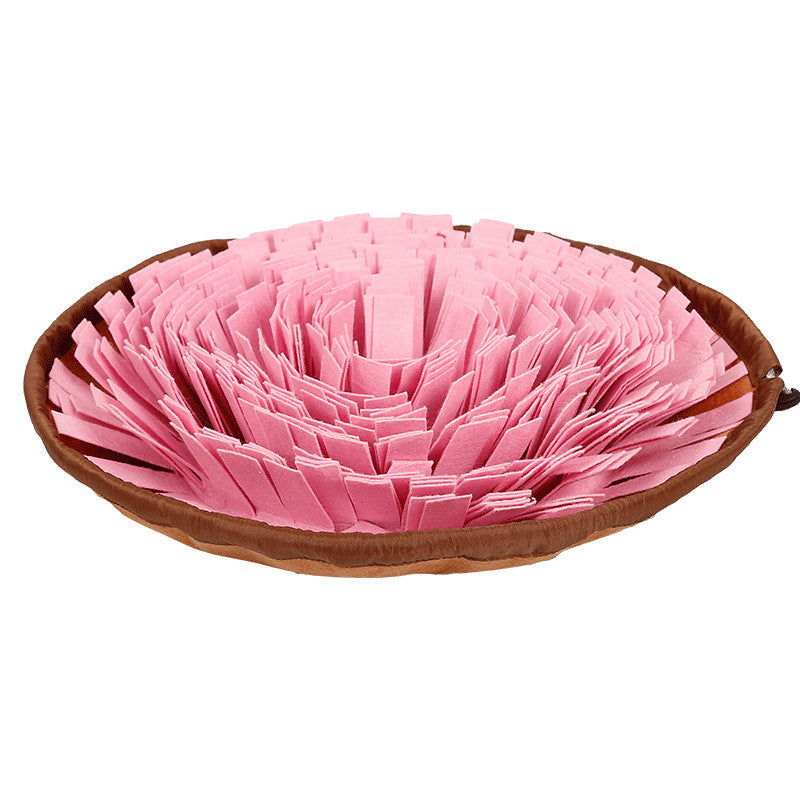 Pink dog snuffle mat with fringe strips on brown base for puzzle feeding training on Tampa Home & Garden Store