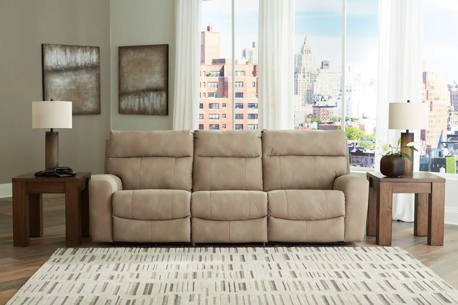 Next-Gen Durapella reclining sectional beige fabric with wood end tables in a city living room on Tampa Home & Garden Store