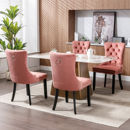 HouseOfZazla pink tufted velvet dining chairs with nailhead trim, four around a marble table on Tampa Home & Garden Store