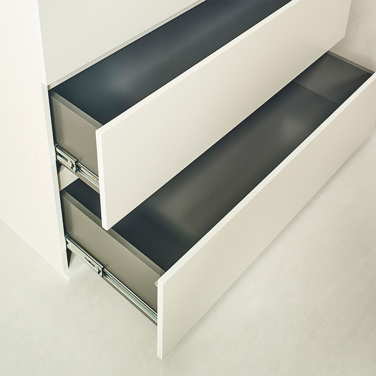 Contemporary wood accent chest with soft-close drawers, white exterior and dark interiors on Tampa Home & Garden Store