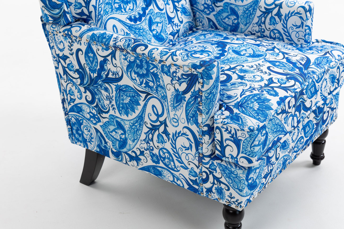 Upholstered accent chair in blue white porcelain print linen with nailhead trim and dark legs on Tampa Home & Garden Store