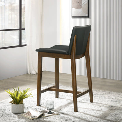 Mid-Century counter chair with full-back black upholstery and solid wooden legs on Tampa Home & Garden Store